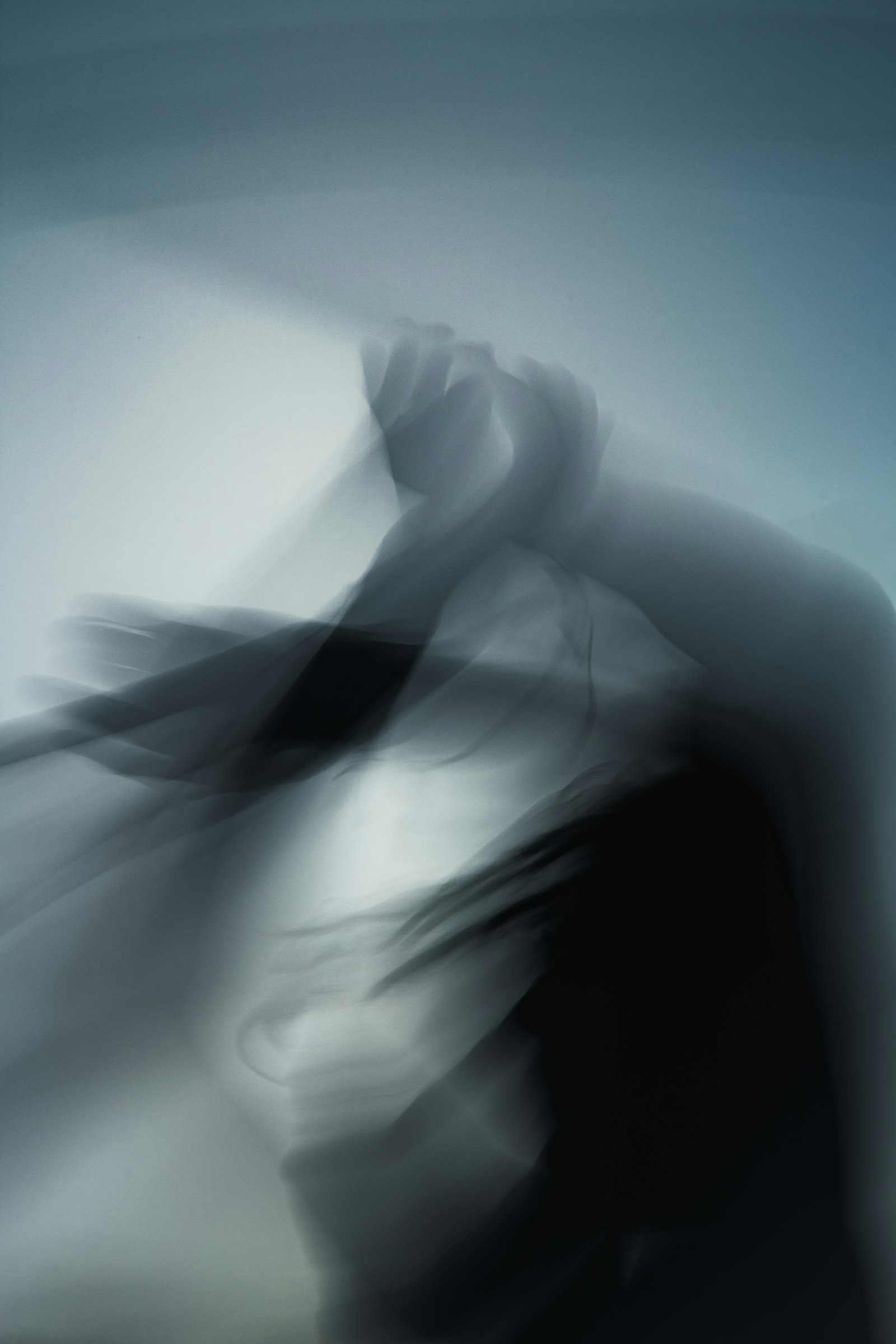 A film still that moved — dancer, motion blur, one hard source. 🎞️